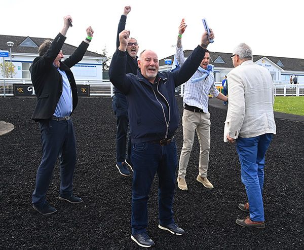 Thehell Parrtnership celebrate the announcement of their photo-finish winner