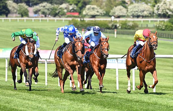 Bint Majestic Roi and Andy Slattery 2nd right 