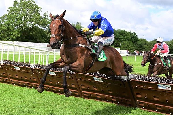 Rockonliam and Darragh O'Keeffe jump the last