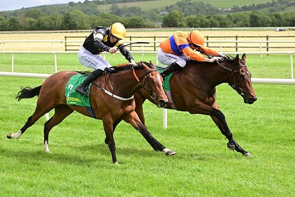Beibhinn and Declan McDonagh (far side) leads Big Negotiator