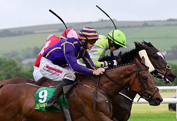 Thelittleballerina, near side, eases past her rivals