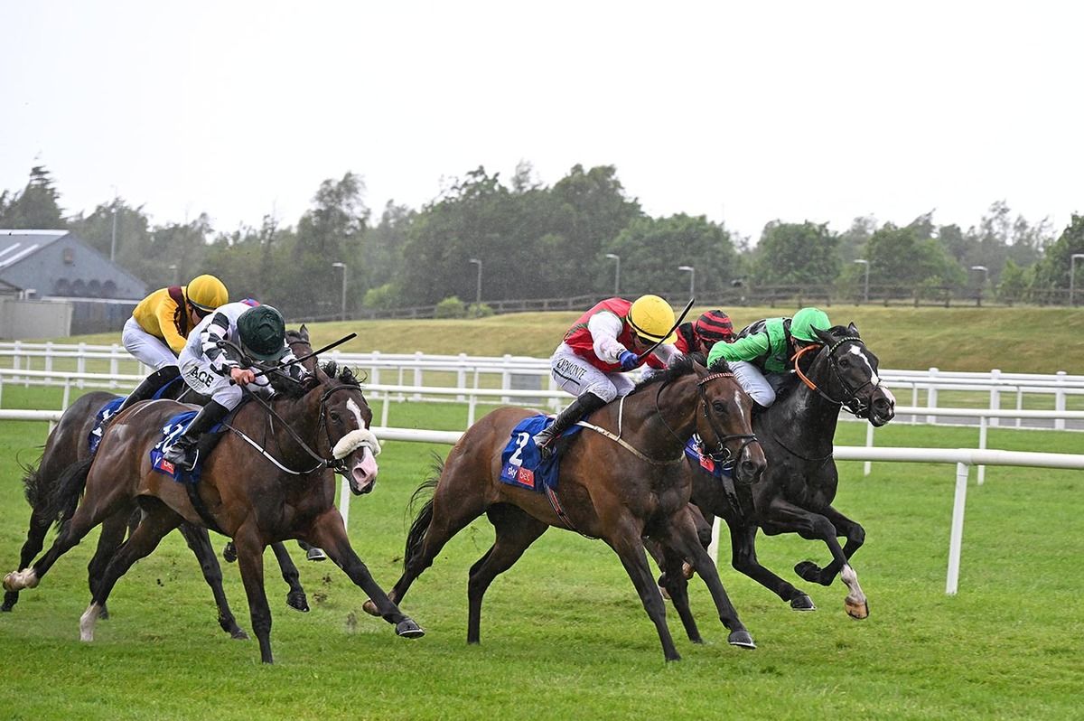 Amiata and Colin Keane (yellow cap) on their way to winning for Ger Lyons at the Curragh this evening