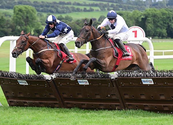 Brother Walfrid (near side) heads Frankie's Freebie over the last
