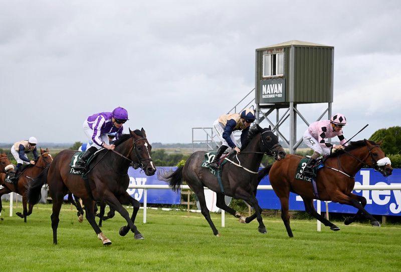 Isaac Newton (left) and Ryan Moore 