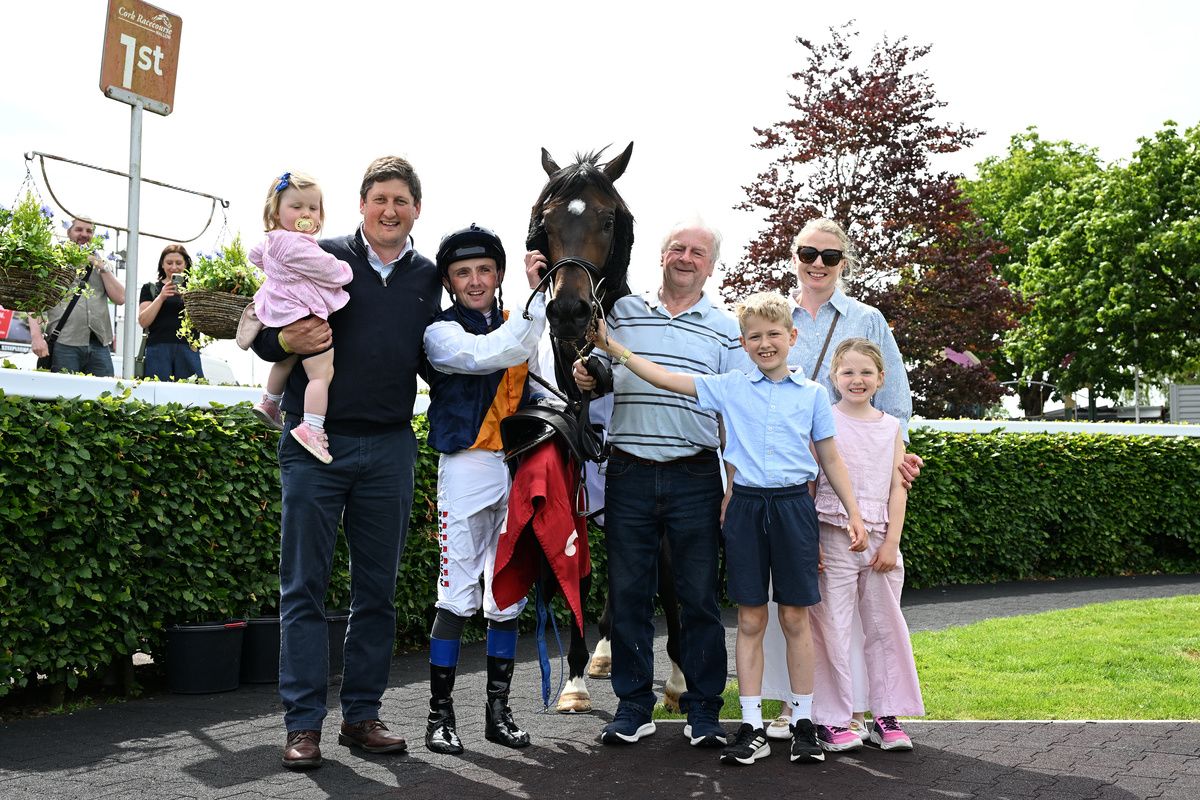 Trainer Kate McGivern with her family and Kendall Roy