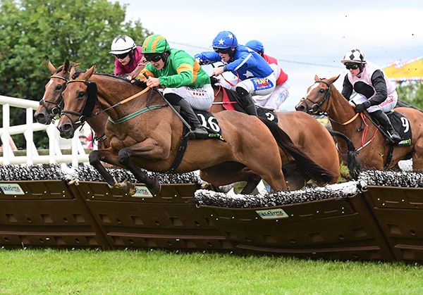 Bellewstown Accustomed and Dan King win the QuinnBet Bellewstown Handicap Hurdle 