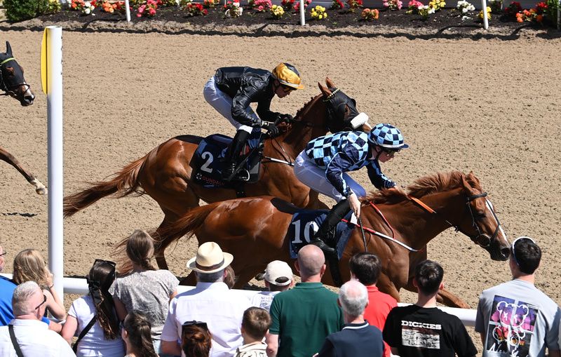 Bullet Bourbon and Rob Whearty win for trainer Tom McCourt 