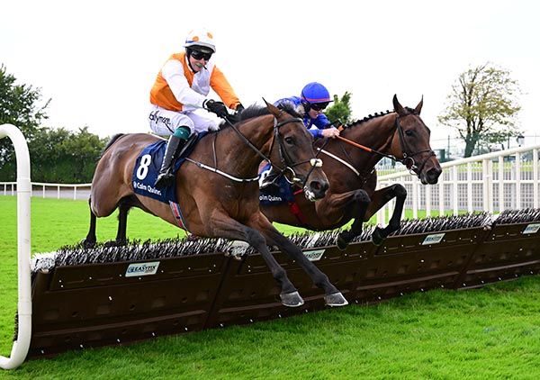 Lizzie Twigg and Jack Kennedy (blue colours) tackle Fastnet Crystal over the last