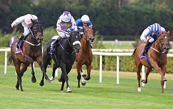 Ethical Diamond and Ryan Moore, left, run down Green Impact, second left
