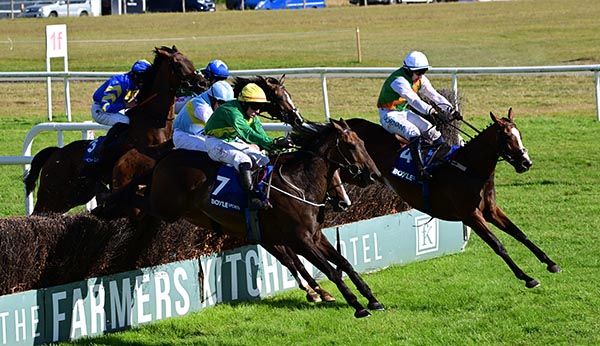 Rightfolksplease Kevin Healy yellow cap win the Boylesports Handicap Steeplechase 