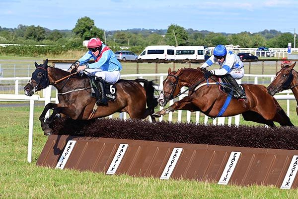 Cooladdi and Kieran Buckley jump the last to win