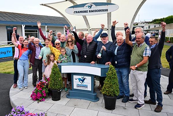 Members of the Terence O' Brien Racing Syndicate celebrate Ina Mina's success