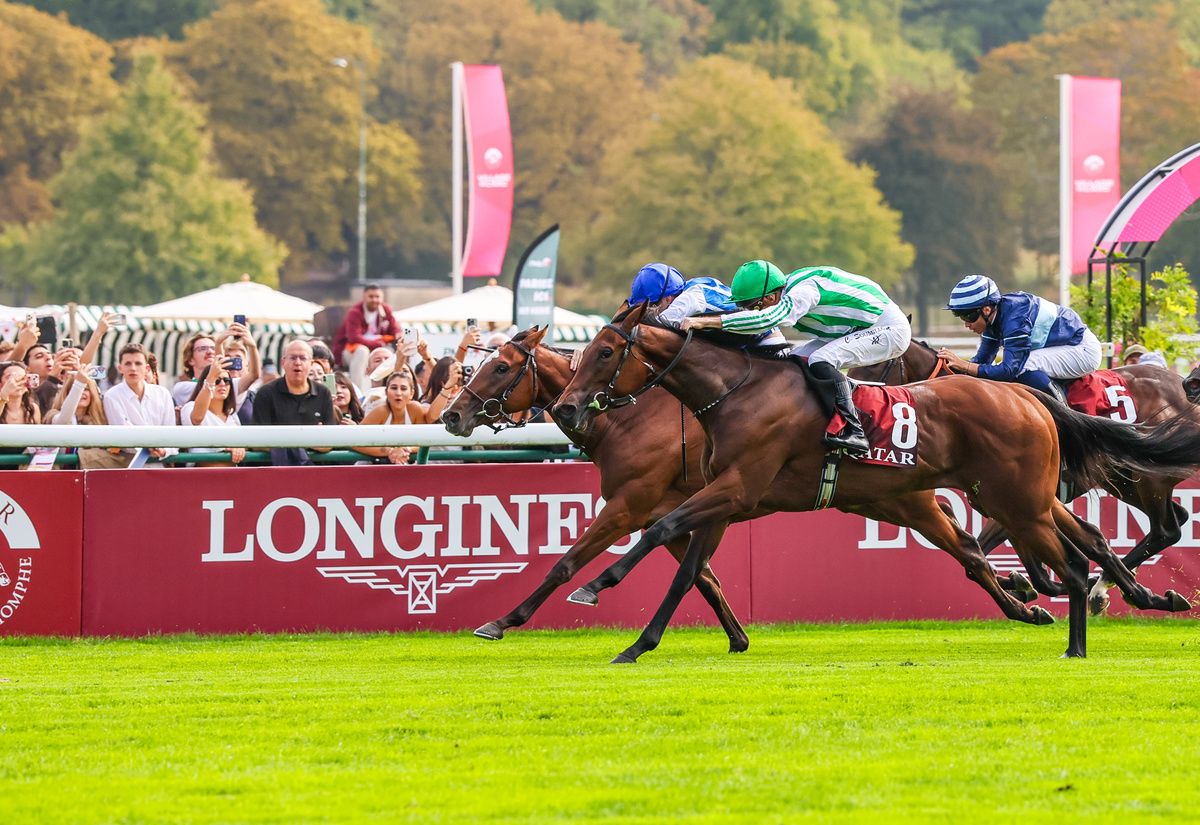 Green Empress and Christophe Soumillon (nearest) win the Prix Marcel Boussac from Dat (partially hidden)