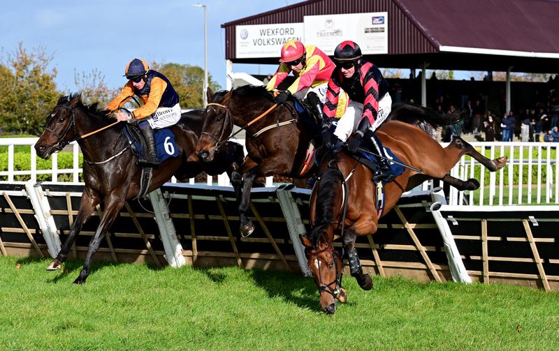 The Two Degrees (far side) is on his way to victory as Noon Blu Dodville falls