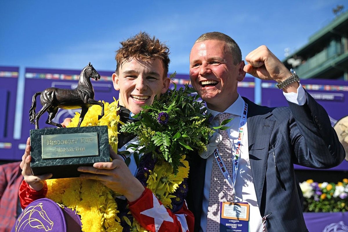 Libertango's rider Billy Loughnane celebrates with trainer George Boughey